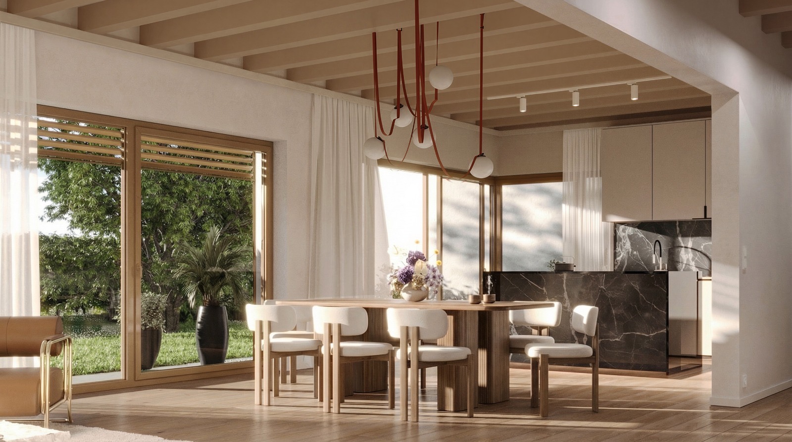 Salle à manger et cuisine ouvertes sur le jardin